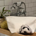 Dog‑illustrated cotton toiletry bag with lined interior and zip, handmade by a UK small business.