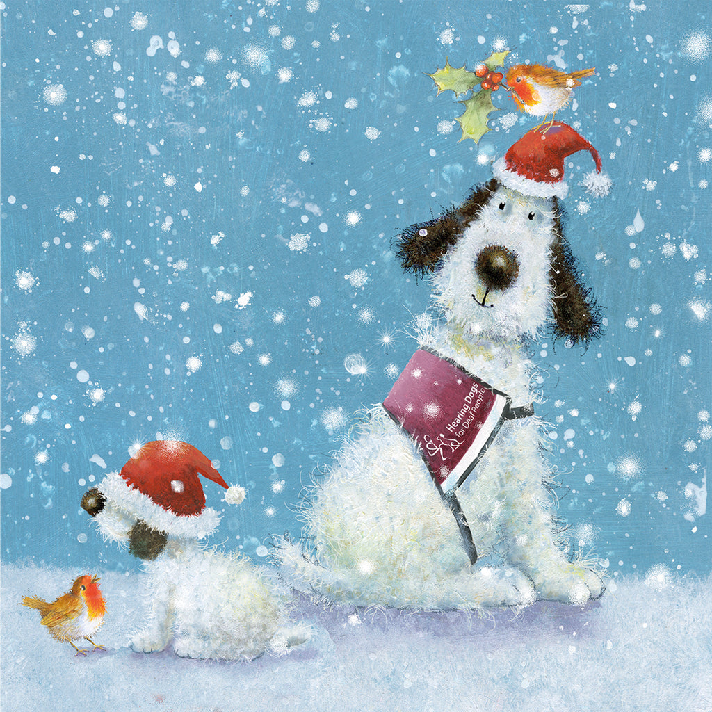 A Christmas card featuring an illustration of a white dog wearing a Santa hat, with snowflakes and birds around it. The dog is holding a book with a Christmas sticker on it.