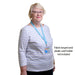 Woman wearing the lanyard and plastic card holder with the hearing loss communication card within. This shows that the card is about the same size as a credit card. There is a note a note that reads