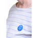 Person wearing blue pin badge with white lettered message 'I'm a lipreader, please face me'