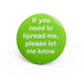 Large green pin badge with white lettered message 'If you need to lipread me, please let me know' on white background