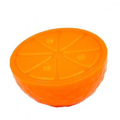 Orange plastic dog toy, in the shape of a segmented orange on a white background