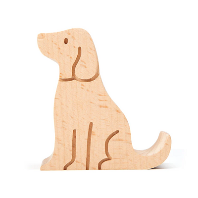 Wooden dog figurine on a white background