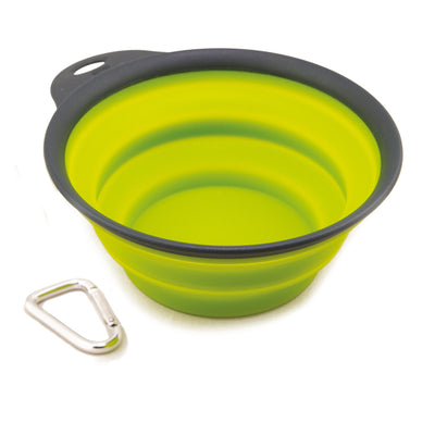 Lime green collapsible bowl in its opened state, with metal clip. Bowl has a black edge.