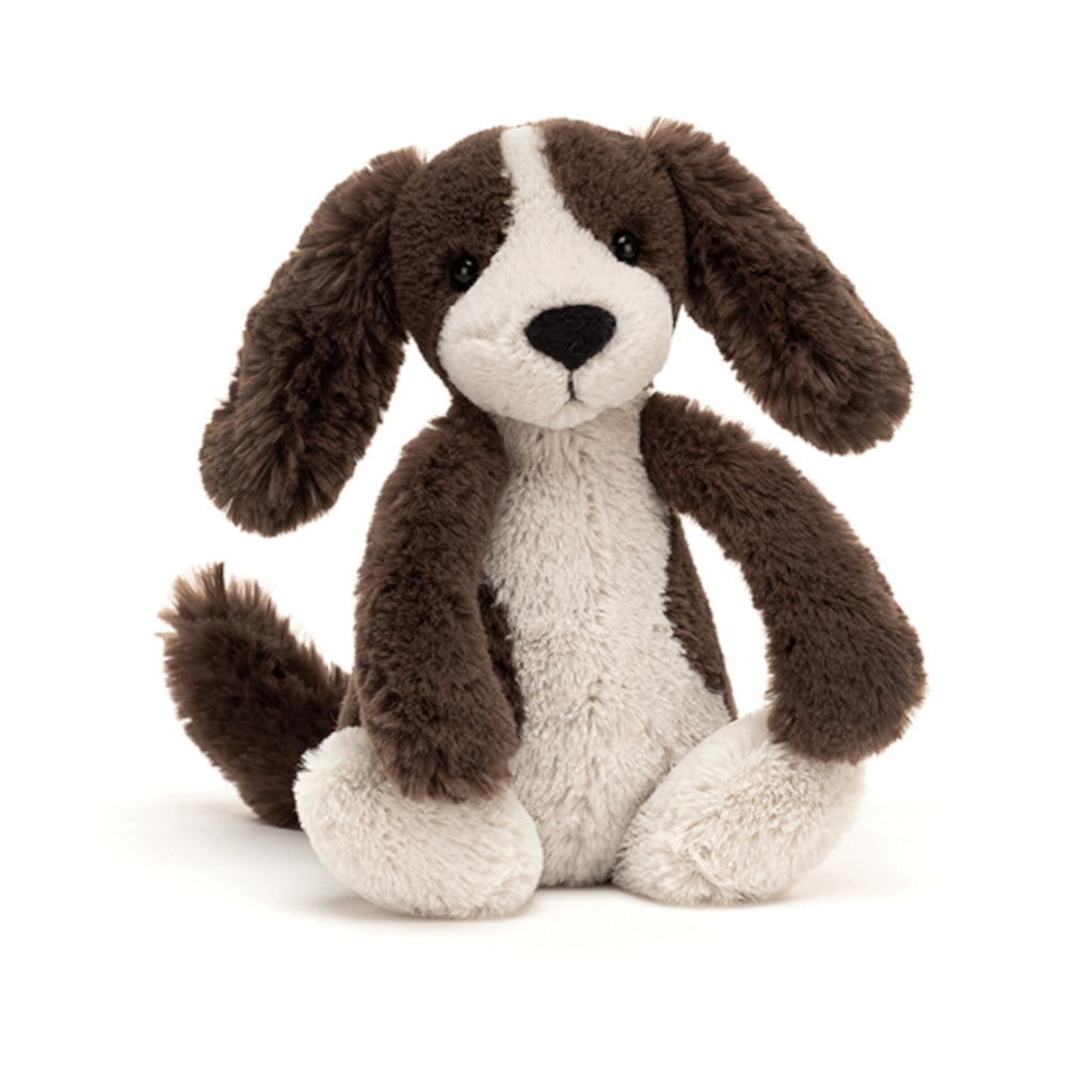 This small children's toy puppy comes with super soft brown and cream fur with a black nose.
