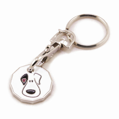 A silver-coloured keyring with a picture of the Hearing Dogs Puppy Face on a pound coin-shaped disc. The puppy has a small heart on its ear.