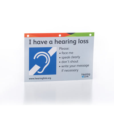 A5 pale grey card reading the message 'I have a hearing loss' and featuring international deaf symbol and Hearing Link logo on a white background.