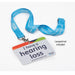 Hearing Link lanyard with large print, light frey card featuring the dark lettered message 'I have hearing loss' and featuring the Hearing Link logo