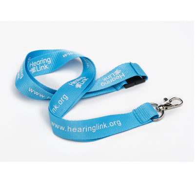 Light blue lanyard displaying white lettered message www.hearinglink.org and Hearing Link logo on a white background.