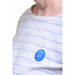 Person wearing blue pin badge with white lettered message 'I'm a lipreader, please face me' 