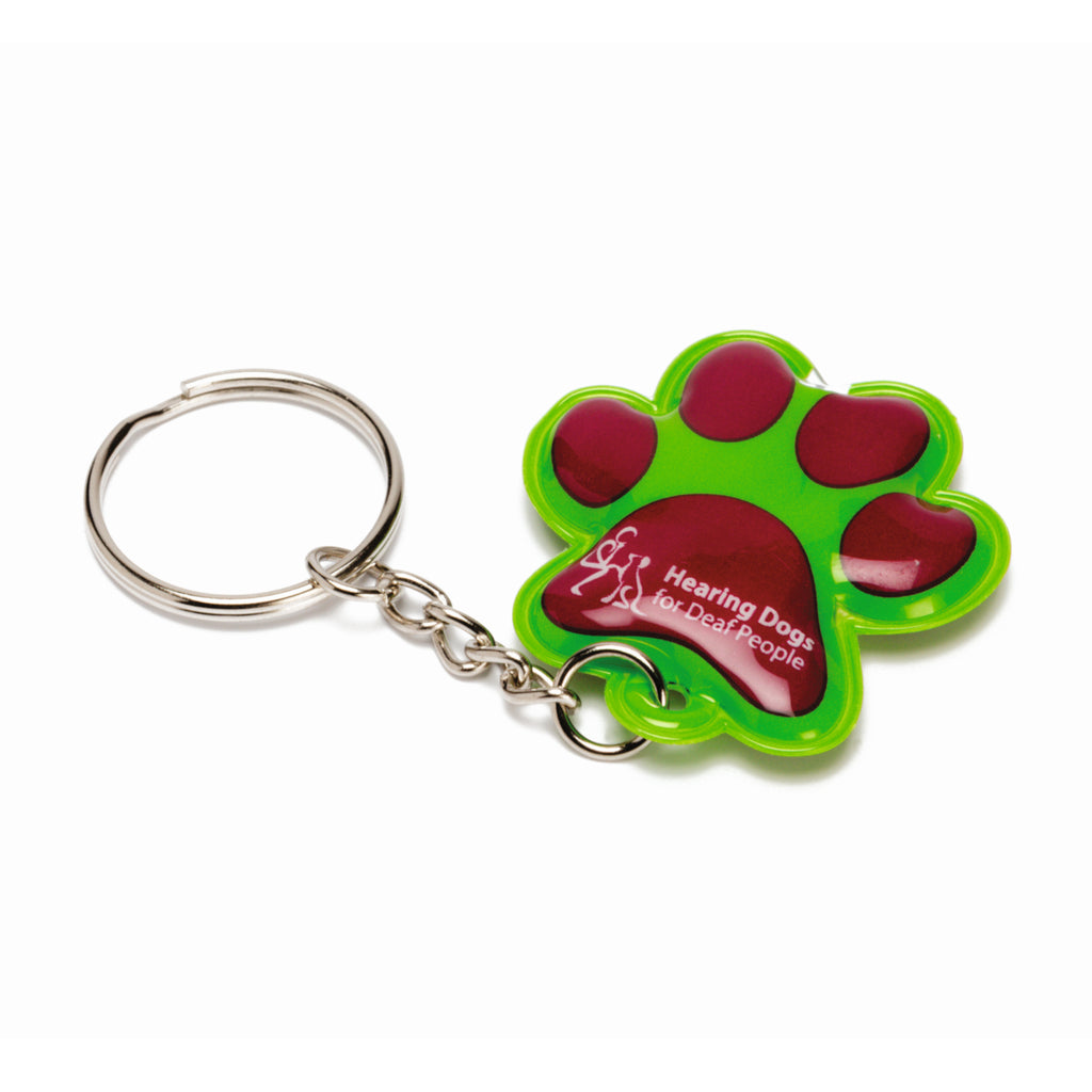 A silver keyring with a paw-shaped torch on the end which is in the Hearing Dogs colours of green and burgundy with the Hearing Dogs logo in the pad of the paw.