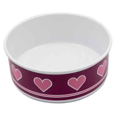 A photograph of a medium sized dog bowl. The inside of the bowl is white and the exterior of the bowl is a dark berry colour with pink hearts with a white outline placed horizontally around the bowl. Underneath the hearts, there is a pink trim with white outline.