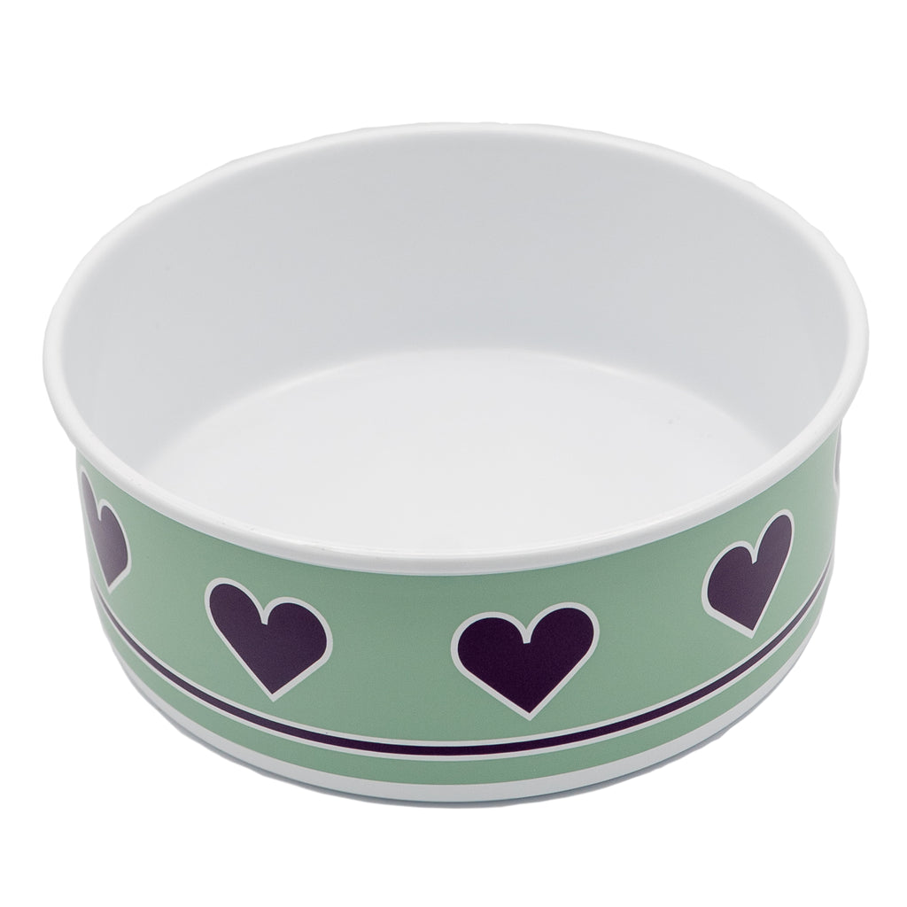 A photograph of a medium sized dog bowl. The inside of the bowl is white and the exterior of the bowl is a mint turqouise colour with black hearts with a white outline placed horizontally around the bowl. Underneath the hearts, there is a black trim with white outline.