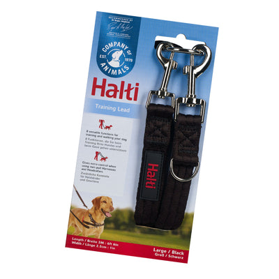 Black fabric lead with silver metal trigger hooks folded around its packaging which says Halti Training Lead with a picture of a yellow Labrador looking happy while wearing the lead.