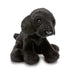 Side view of a small black Labrador soft toy with black eyes and a black nose, in a sitting position